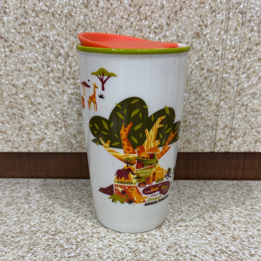 Starbucks Disney Animal Kingdom White Travel Mug with Orange Lid